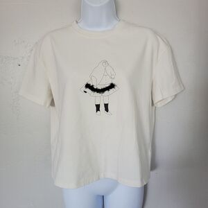Initial Fashion Ivory Short Sleeve T-shirt Man Wearing Black Tulle Skirt Funky